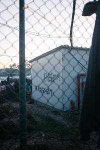 A graffiti on a shelter in the closed camp in Moria.